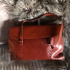 Lovely used Kenneth Cole briefcase. Some damage